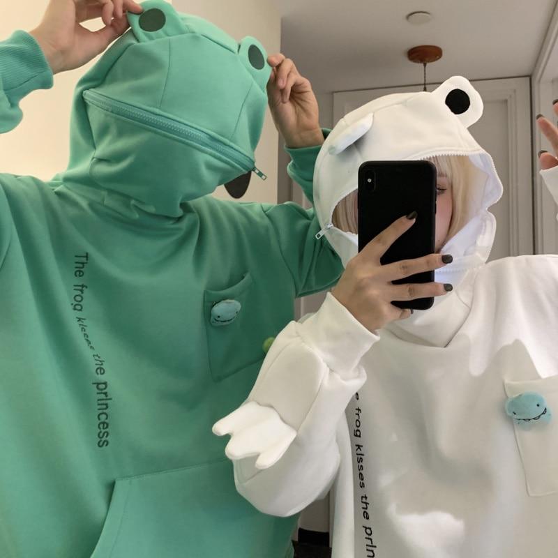 Unisex-hoodie med frø-design – Efterårsagtig Froggy-magi