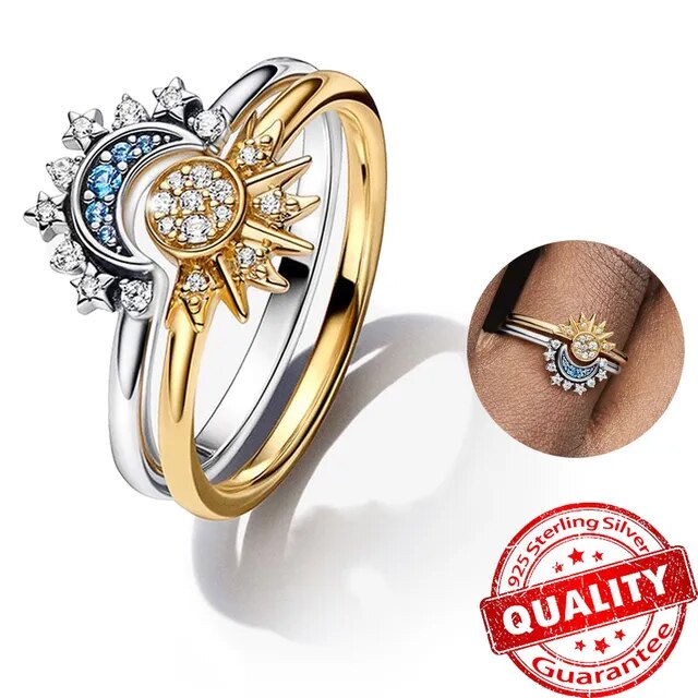Dreiteiliger Ring aus 925er Silber, goldfarben, mit Sonne-Mond-Design und Zirkonia-Steinen.