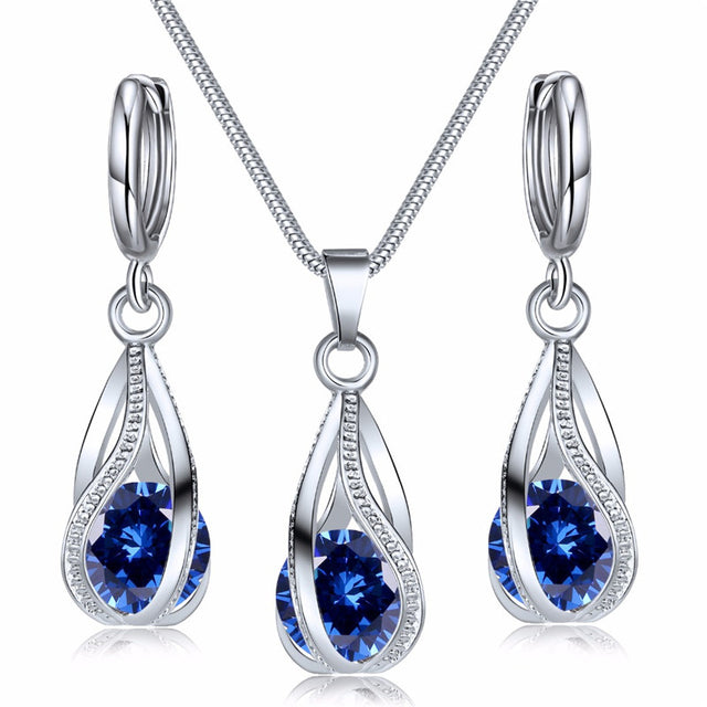 Silberne Halskette und Ohrringe Set mit blauen Zirkonia, eleganter Hochzeitsschmuck für Frauen.