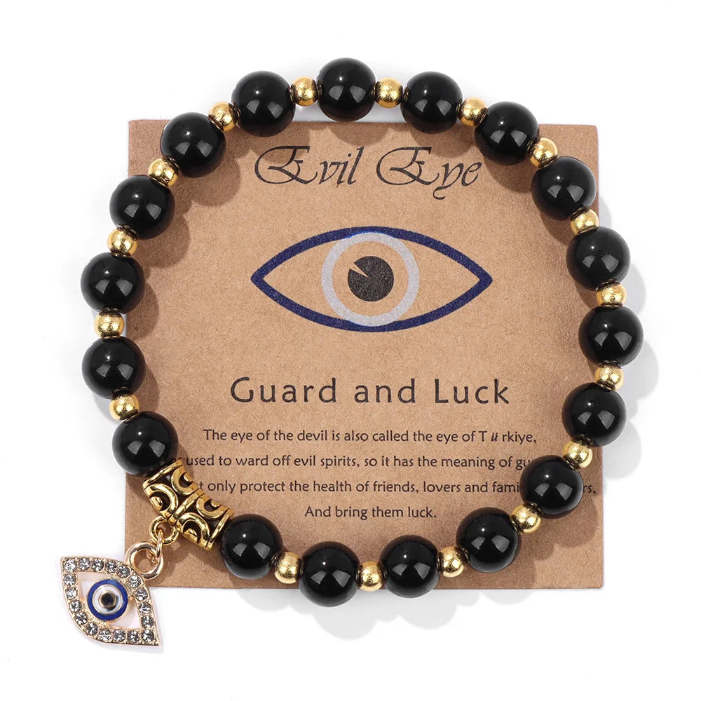 Schwarzes Onyx-Armband mit goldenen Perlen und Nazar-Anhänger, Schutz und Glück.