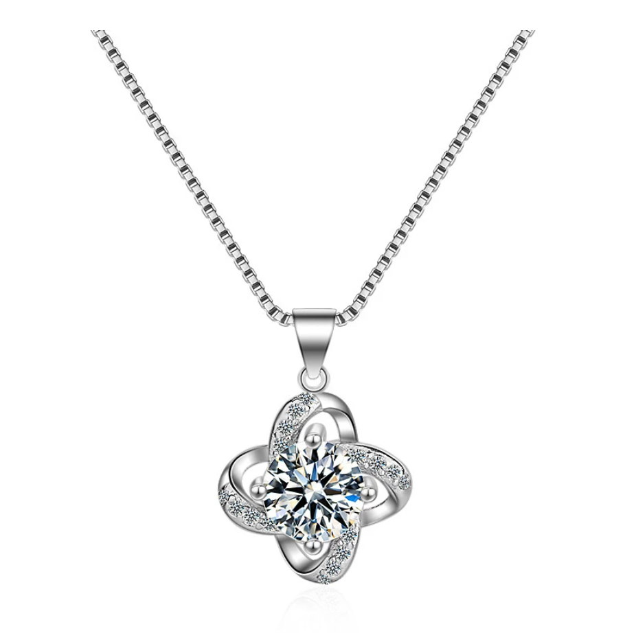 Silberne Halskette mit funkelndem Blumenanhänger, Zirkonia, elegantes Schmuckdesign.