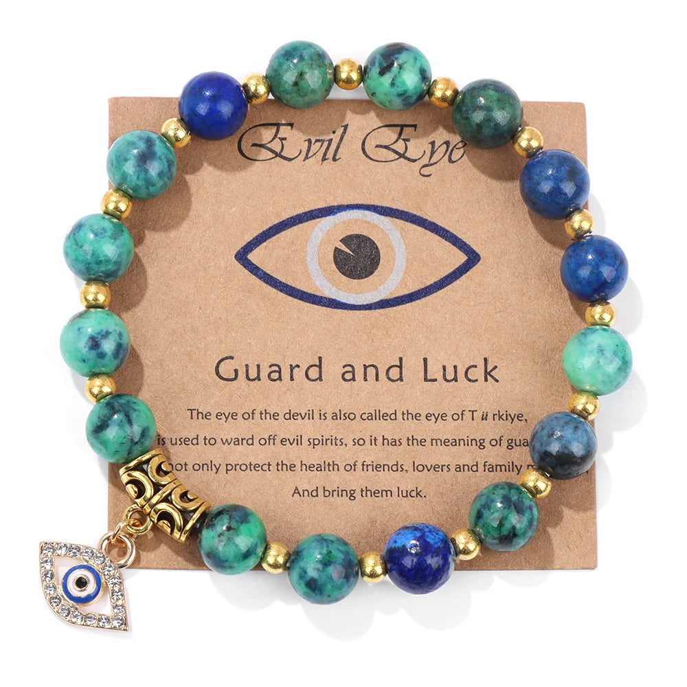 Blau-grünes Armband mit goldenen Perlen und bösem Auge-Anhänger, Schutz und Glück.