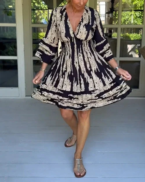 Efterårsinspireret og stilfuld damekjole med V-hals og 3/4-ærmer – Elina