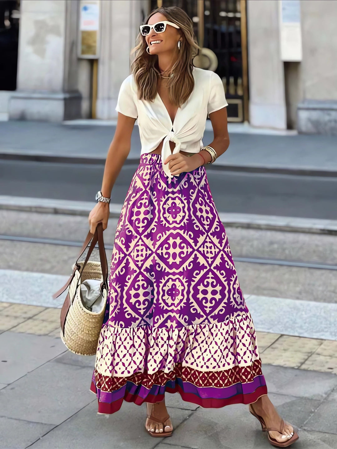 Printet boho maxi-nederdel med flydende snit og frynser – Yalina