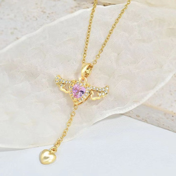 Goldene Halskette mit Herzanhänger, rosa Kristall, Engelsflügel-Design, Damen-Schmuck.