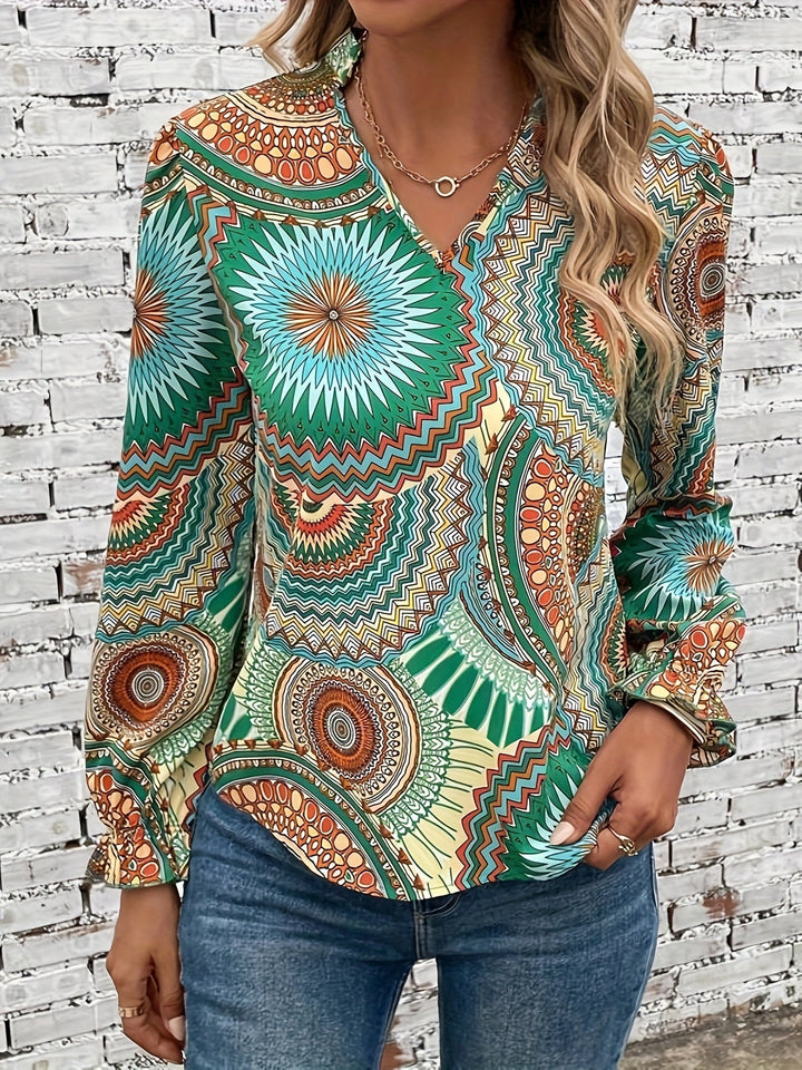 Damebluse med blomsterprint og V-udskæring til forår og efterår – Selina