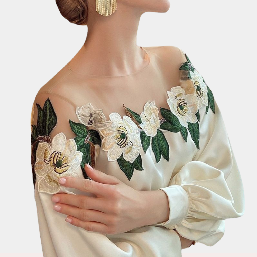 Blomstret beige damebluse med løs pasform – Elvira
