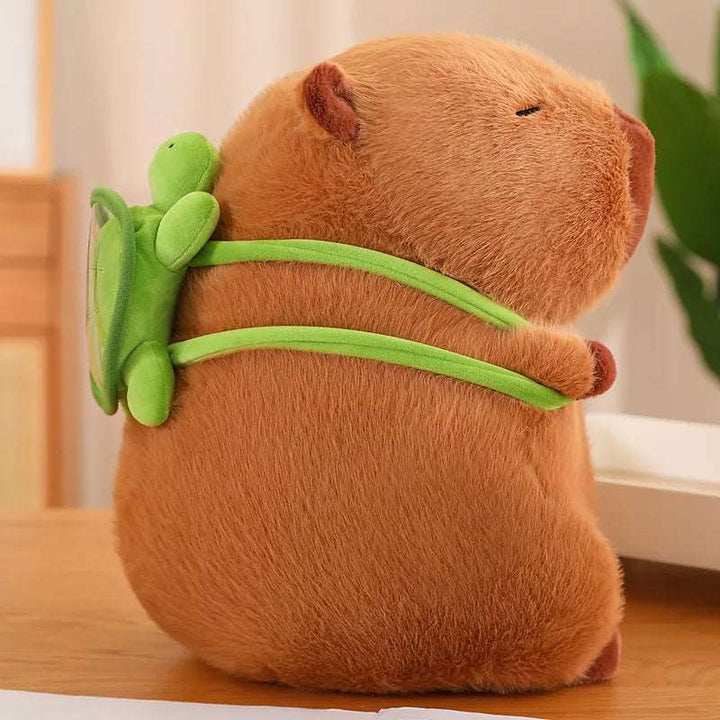 Kramme-Capybara med skildpadderygsæk - TurtleBuddy