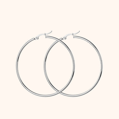 Silberne Creolen Ohrringe, Edelstahl, minimalistisches Design, modischer Schmuck für Damen.