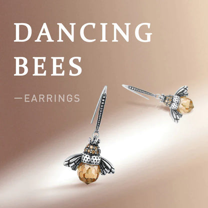 Bienen-Ohrringe aus Silber mit goldenen Details, elegantes Design, Schmuck für Damen.