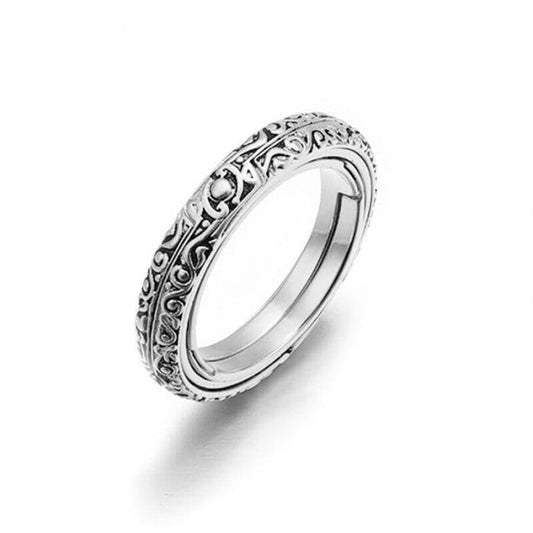 Silberner Ring mit filigranem Muster, Schmuck, Edelstahl, elegantes Design, Damenmode.