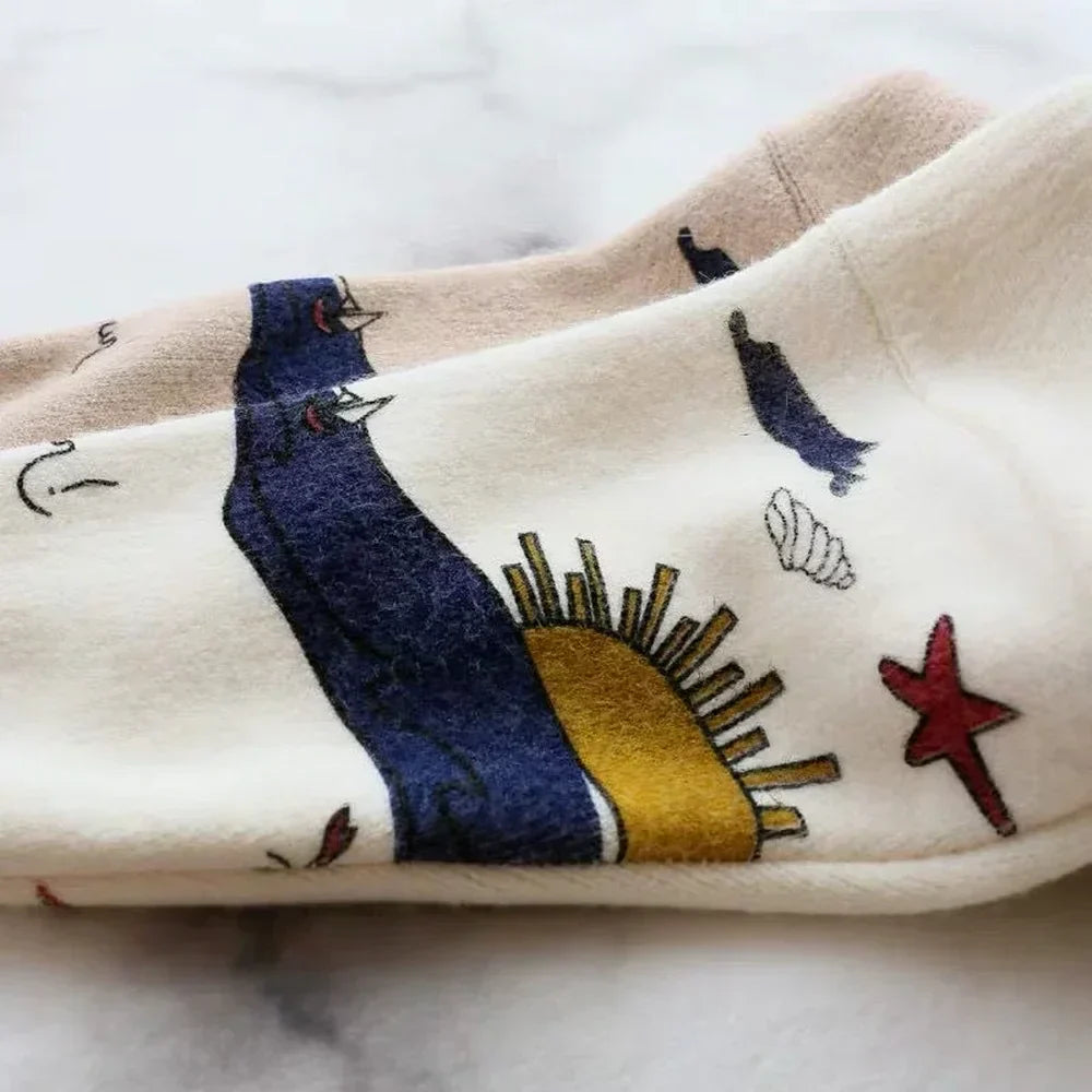Strikket cardigan med legesygt print og knaplukning - Nova