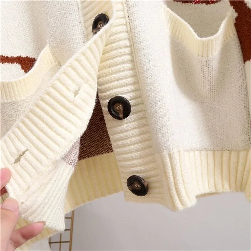 Strikket cardigan med legesygt print og knaplukning - Nova