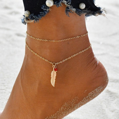 Boho-Fußkettchen mit Zirkonia, goldene Kette, Federanhänger, Damen-Schmuck, Strandaccessoire.