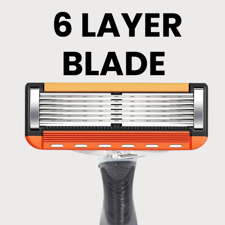 Nærbillede af et barberblad set forfra med seks parallelle klinger, orange øvre kant og orange smøreliste, monteret på et gråt skaft. 5