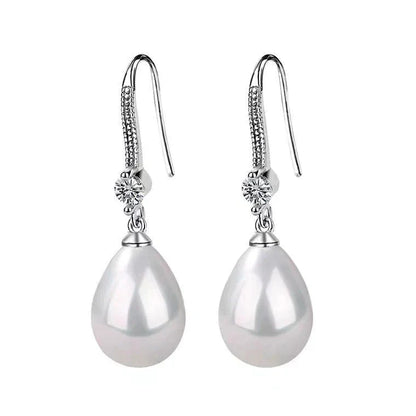 Silberne Ohrringe mit Perlenanhänger und Zirkonia, eleganter Schmuck für Damen.
