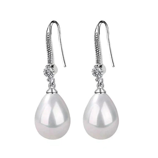 Silberne Ohrringe mit Perlenanhänger und Zirkonia, eleganter Schmuck für Damen.