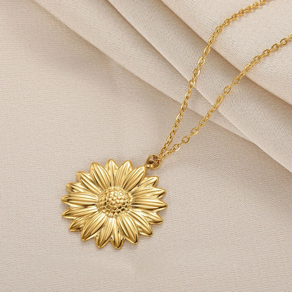 Goldene Sonnenblumen-Halskette, elegantes Schmuckstück, Damen-Accessoire, modisches Design.