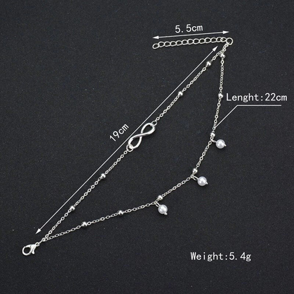 Silbernes Infinity-Fußkettchen mit Perlen, verstellbar, 22 cm Länge, 5,4 g Gewicht.
