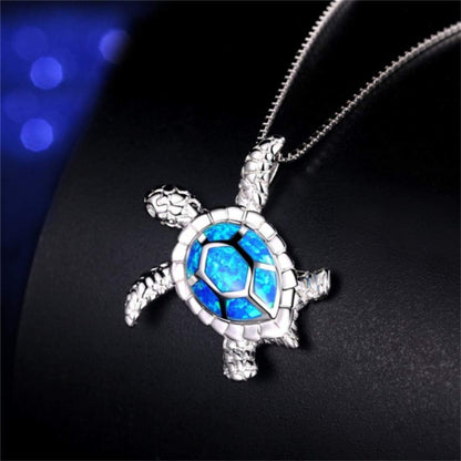 Silberne Schildkrötenkette mit blauem Opal, Damen Schmuck, elegantes Design, Geschenkidee.