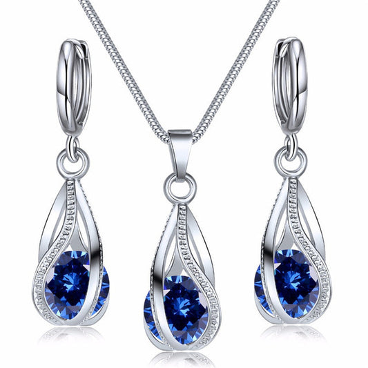 Silberne Halskette und Ohrringe Set mit blauen Zirkonia, eleganter Hochzeitsschmuck für Frauen.