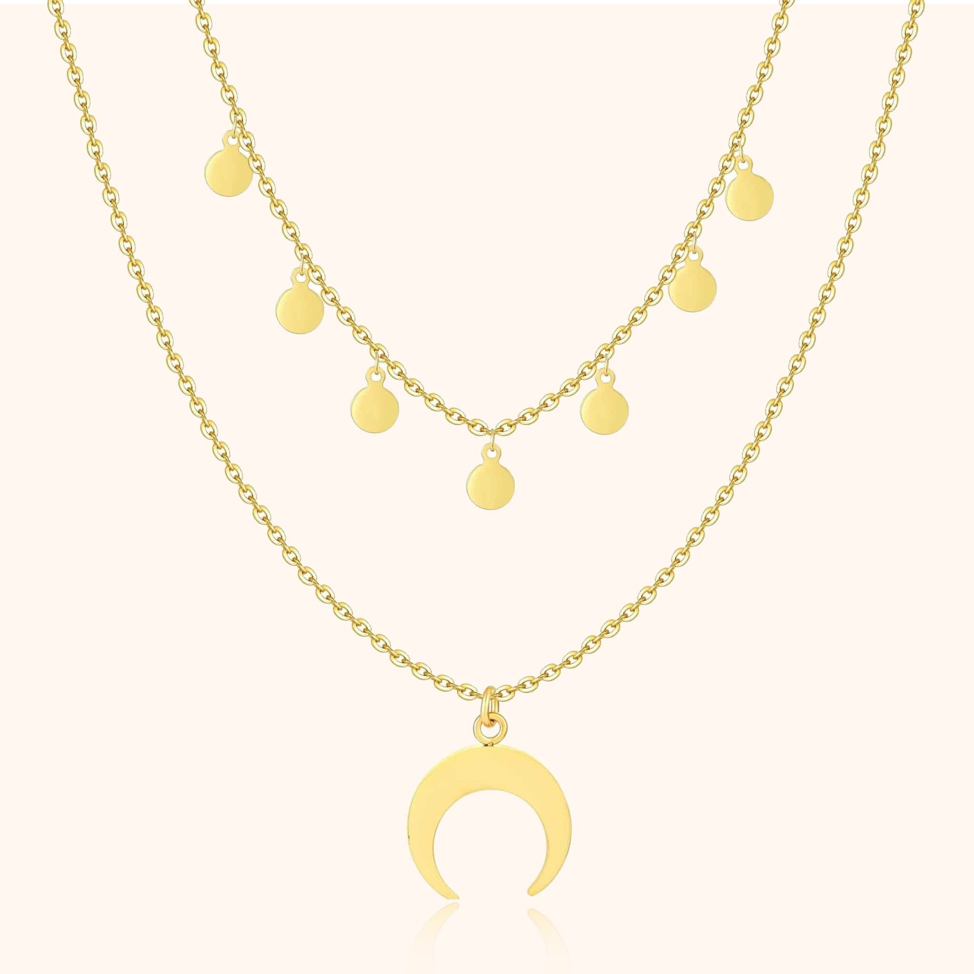 Goldene Halskette mit Halbmond-Anhänger und runden Anhängern, modischer Schmuck.