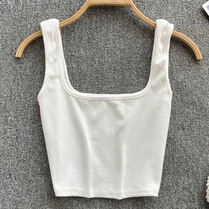 Rygfri cropped tanktop i ensfarvet – Zayra