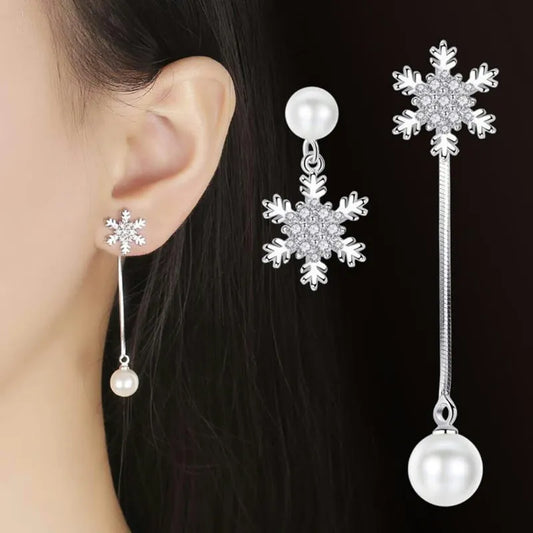 Silberne Schneeflocken-Ohrringe mit Perlen, eleganter Schmuck für Damen.