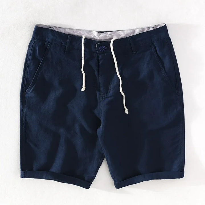 Strandshorts til mænd i hør-bomuld med sommerlook og knaplukning - Sandro