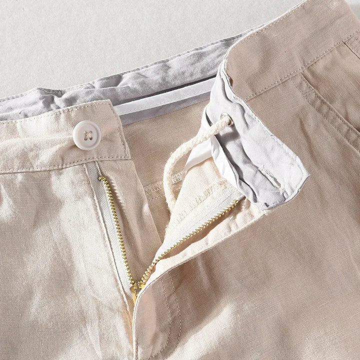 Strandshorts til mænd i hør-bomuld med sommerlook og knaplukning - Sandro