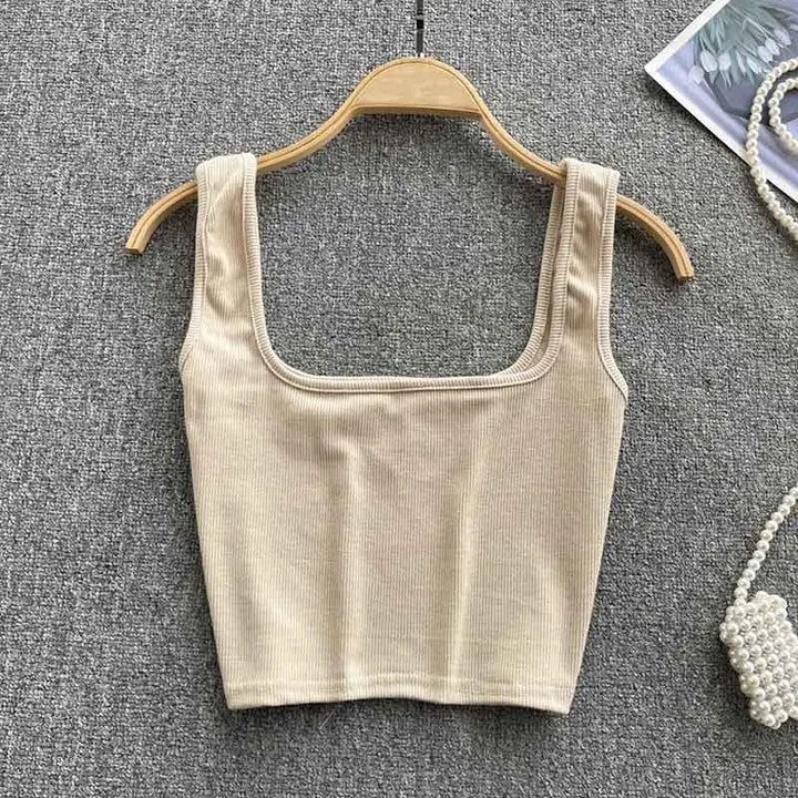 Rygfri cropped tanktop i ensfarvet – Zayra