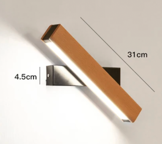 Længere drejelig væglampe i træ med sort base og målene 31 cm og 4,5 cm angivet. 5