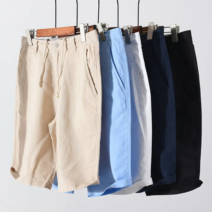 Strandshorts til mænd i hør-bomuld med sommerlook og knaplukning - Sandro