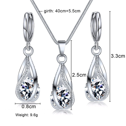 Silberne Halskette und Ohrringe Set mit Zirkonia, elegantes Schmuckdesign, Maße angegeben.