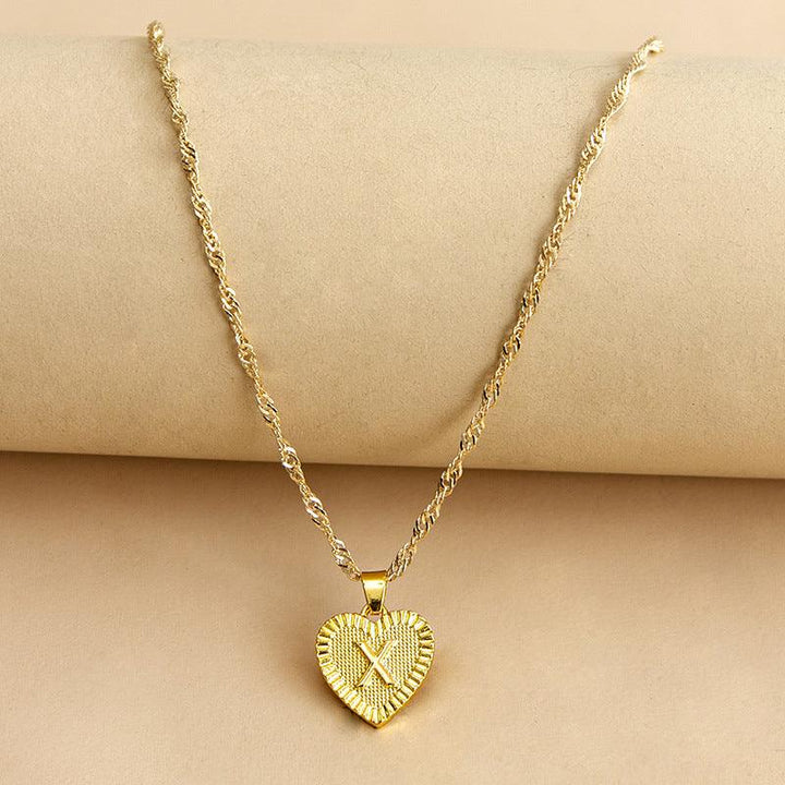 Goldene Herz-Halskette mit Kordelkette, elegantes Schmuckdesign, ideal als Geschenk für Frauen.