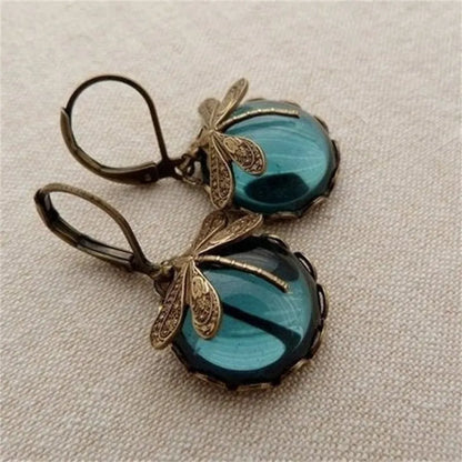 Vintage Ohrringe mit Libellenmotiv, blaues Glas, antikes Messing, handgefertigter Schmuck.