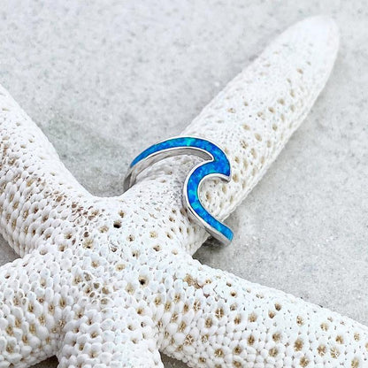 Silberring mit blauem Opal-Wellen-Design auf Seestern, eleganter Schmuck für Damen.