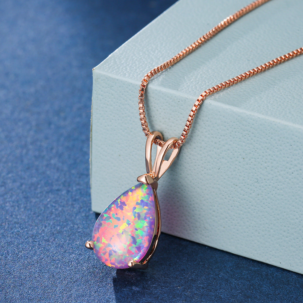 Opal-Anhänger Halskette, roségold, Tropfenform, schillernd, eleganter Schmuck für Damen.
