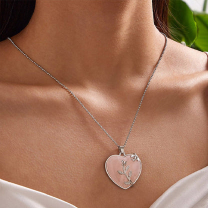 Herzanhänger Halskette Silber mit rosa Stein und Blattdesign, eleganter Schmuck für Damen.