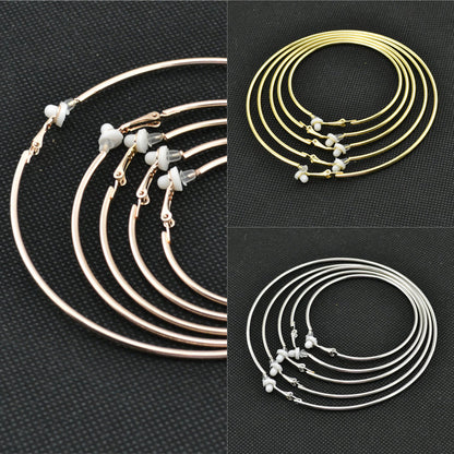 Ohrringe ohne Stecker, roségold und silber, klassisch, modisch, Kreolen, Clip-Design.
