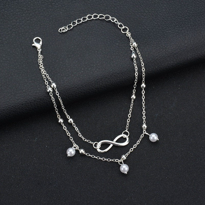 Silbernes Armband mit Unendlichkeitssymbol, Perlenanhänger, verstellbar, Damen-Schmuck.
