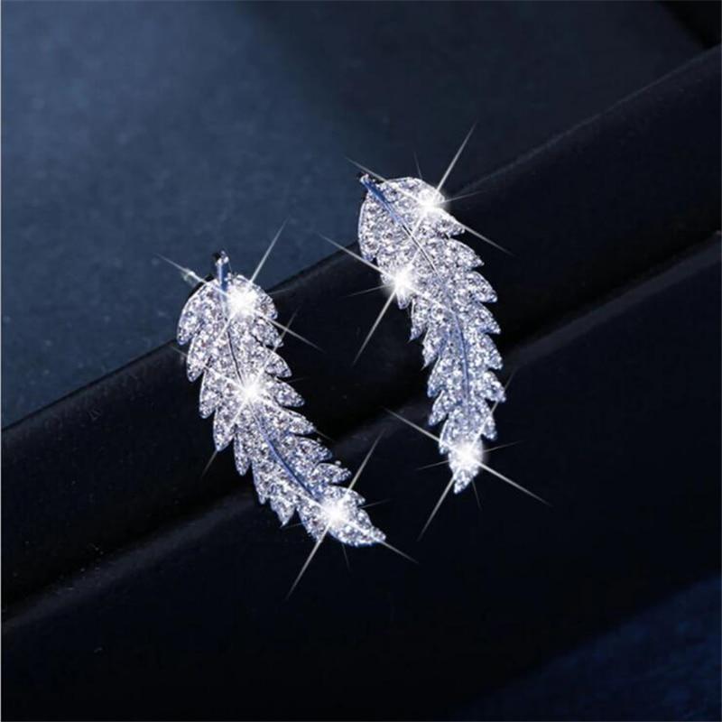 Silberne Blatt-Ohrringe mit Strasssteinen, funkelnd, eleganter Schmuck für Damen.