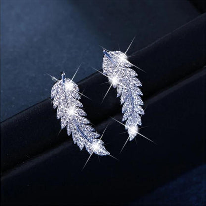 Silberne Blatt-Ohrringe mit Strasssteinen, funkelnd, eleganter Schmuck für Damen.