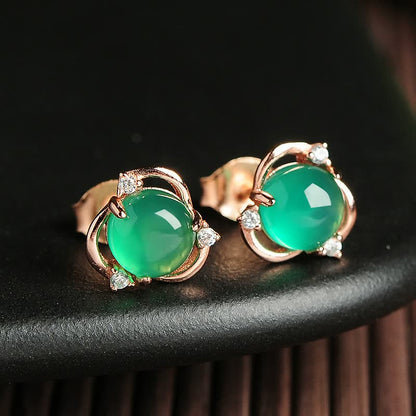 Grüne Edelstein-Ohrringe mit Goldfassung und Diamanten, eleganter Schmuck für Damen.