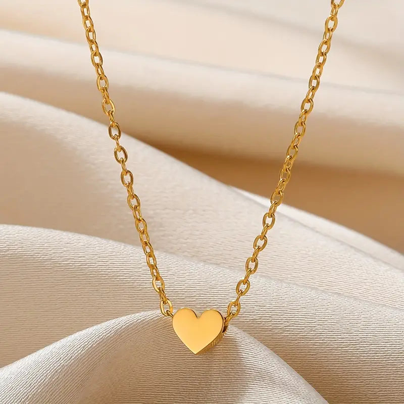 Goldene Herz-Halskette, zarte Kette, Damen-Schmuck, elegantes Design, Geschenkidee.