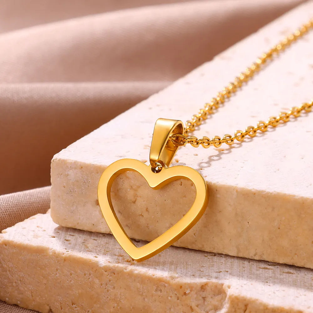 Goldene Herz-Halskette, Edelstahl, Damen-Schmuck, modisches Accessoire, Geschenkidee.