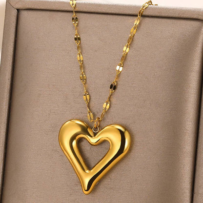 Goldene Herz-Halskette, glänzend, elegantes Design, Schmuck für Damen, Geschenkidee.