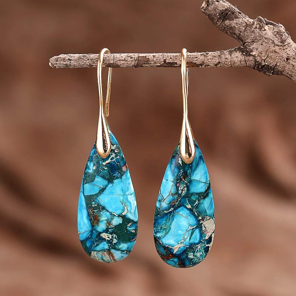 Blaue Tropfen-Ohrringe mit goldenen Haken, Schmuck für Damen, elegantes Design.