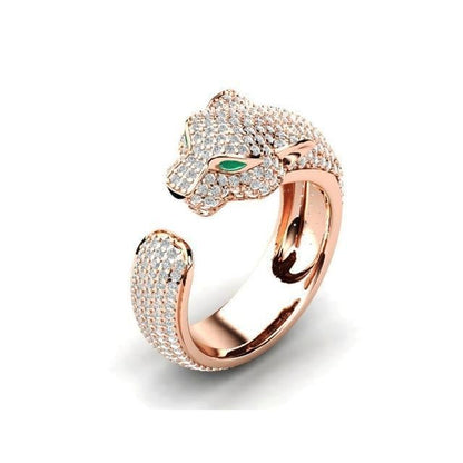 Goldener Panther-Ring mit Diamanten, Smaragd-Augen, luxuriöses Schmuckdesign.