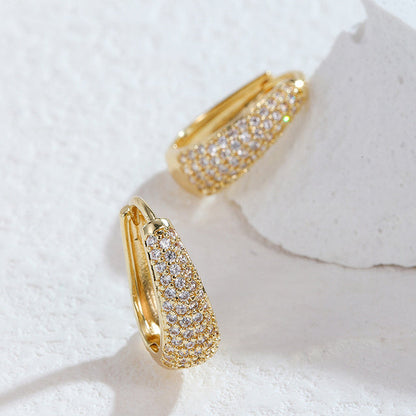 Goldene Ohrringe mit Zirkonia, luxuriös, elegant, Schmuck für Frauen, Geschenkideen.